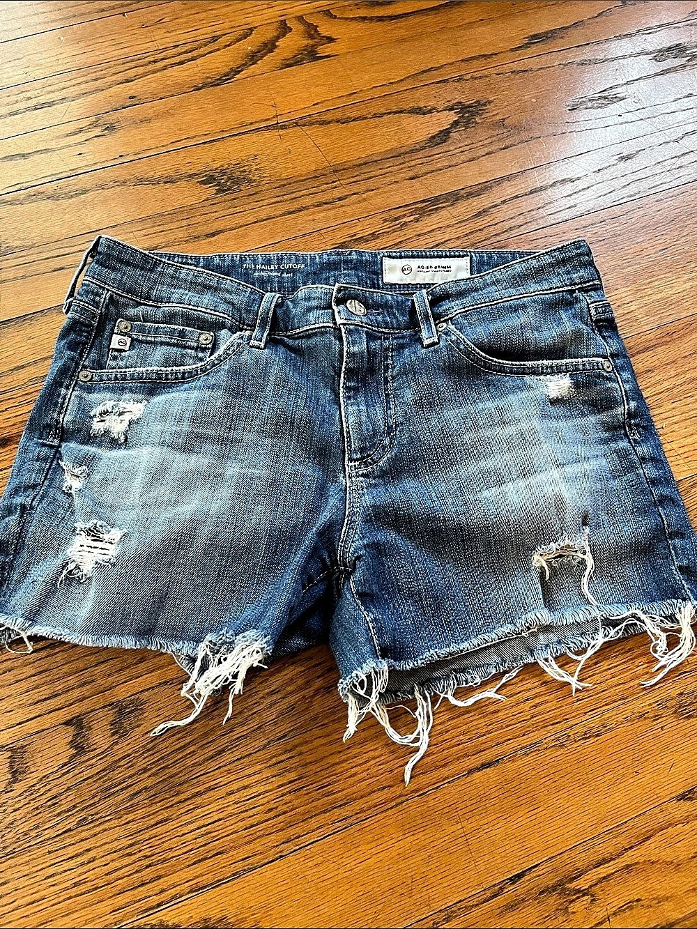 AG Adriano Goldschmied The Hailey Cutoff Distressed Denim Cutoff Shorts Blue